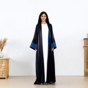 Black open abaya with blue striped cuffs over a white inner