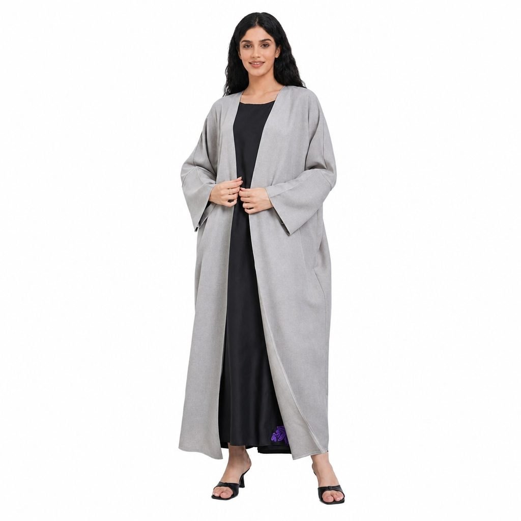 Grey open abaya over a black inner dress