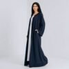 Navy open abaya over a white inner dress