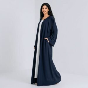 Navy open abaya over a white inner dress